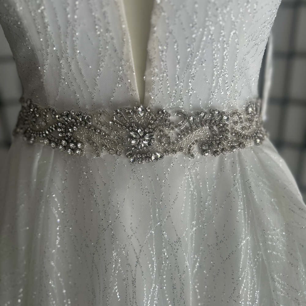 Elegant Glittery White Gown with Silver Accents - Picture 5 of 7